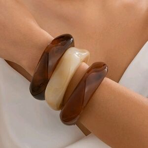 Urban Outfitters Cream, Orange, and Brown Bracelets